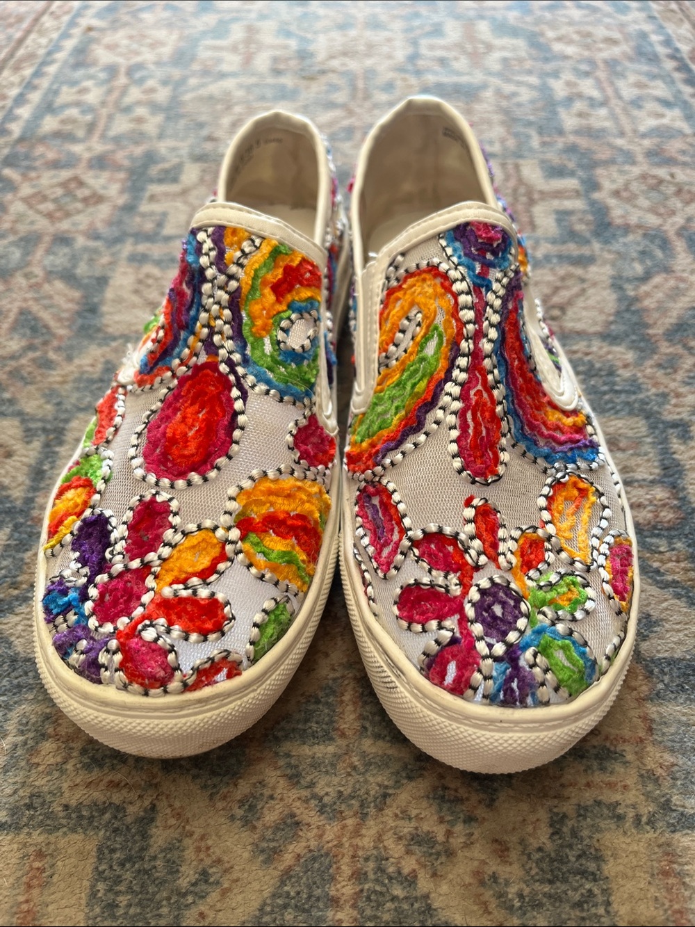 Embroidered slip ons